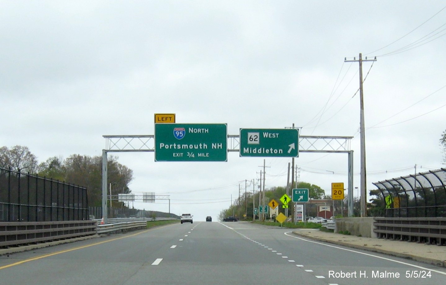 Image of recently placed overhead signs for MA 62 West exit on US 1 North in Danvers, May 2024