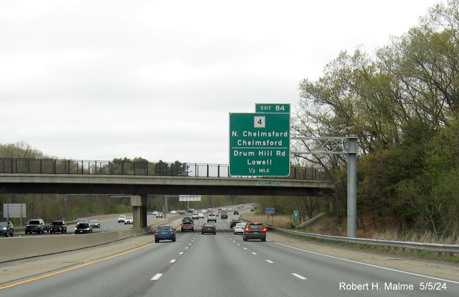 Image of new 1/2 mile advance sign for MA 4/Drum Hill Road exit on US 3 North in Chelmsford, May 2024