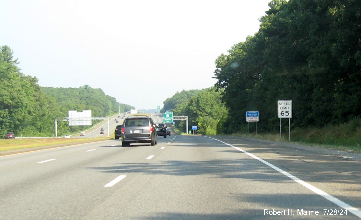 Image of new Speed Limit 65 sign at start of US 3 North/Northwest Expressway in Burlington, July 2024