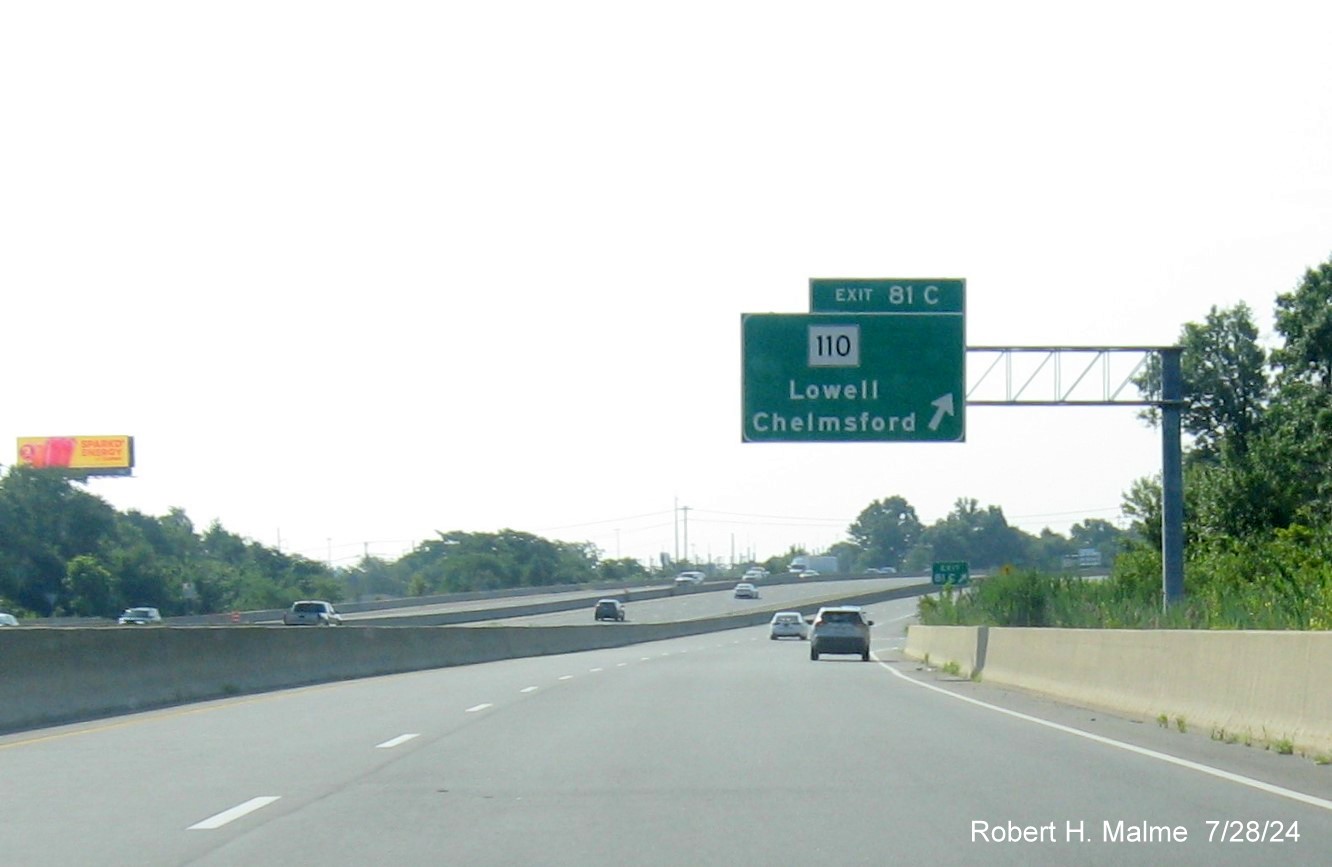 Image of recently placed overhead ramp sign for MA 110 exit on C/D ramp from US 3 South in Chelmsford, July 2024