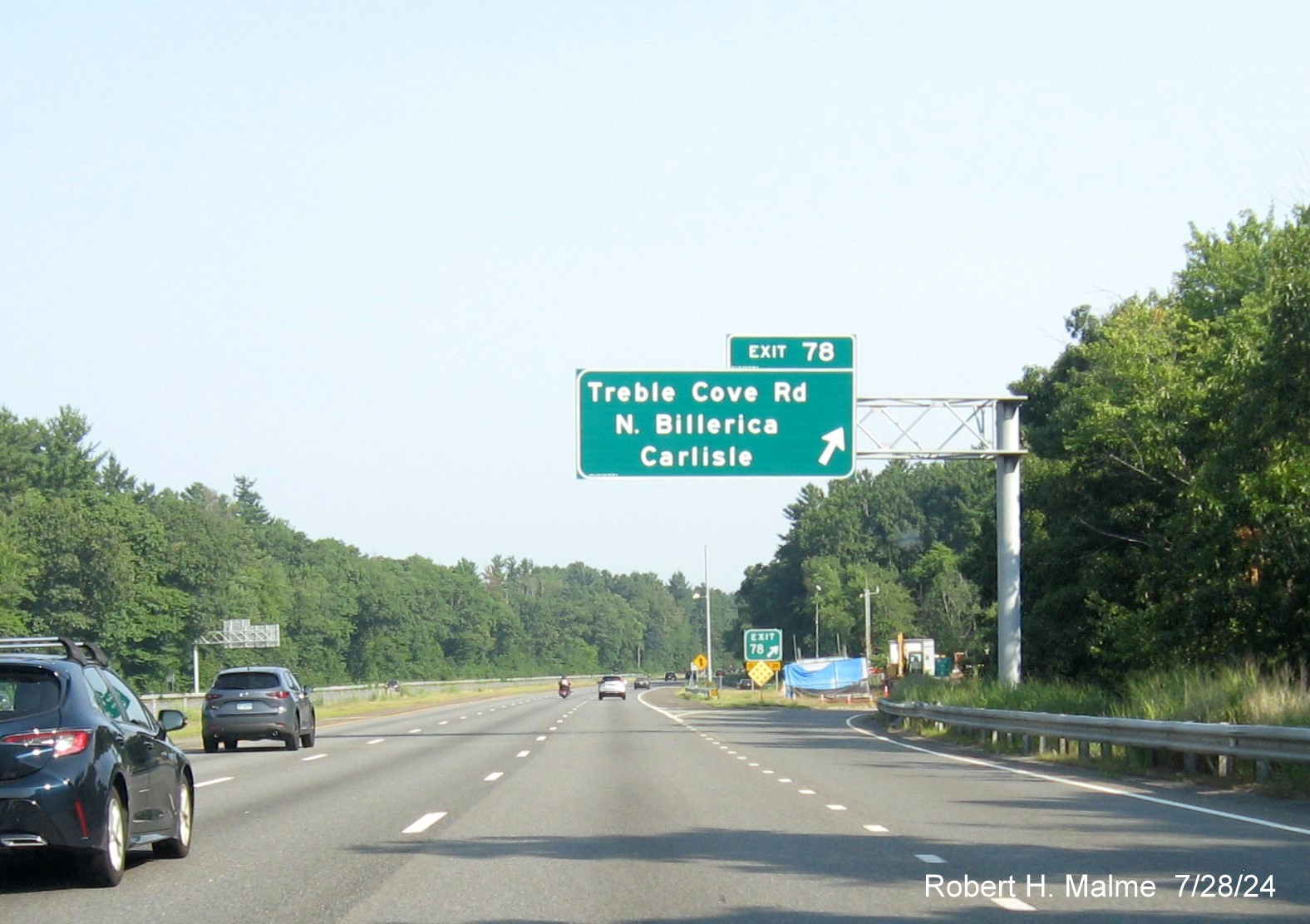 Image of recently placed overhead ramp sign for Treble Cove Road exit on US 3 North in Billerica, July 2024