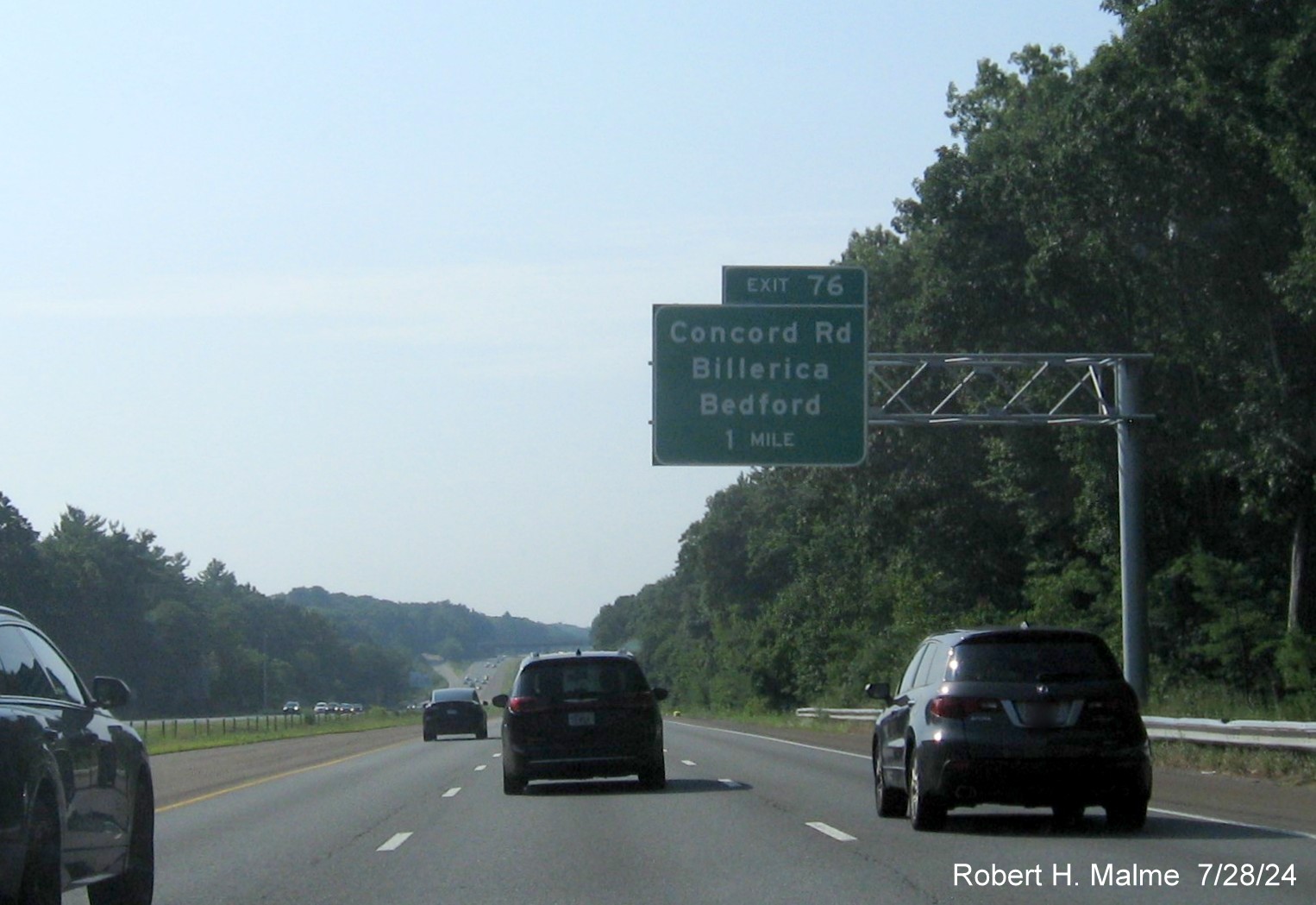 Image of recently placed 1 mile advance overhead sign for Concord Road exit on US 3 South in Bedford, July 2024