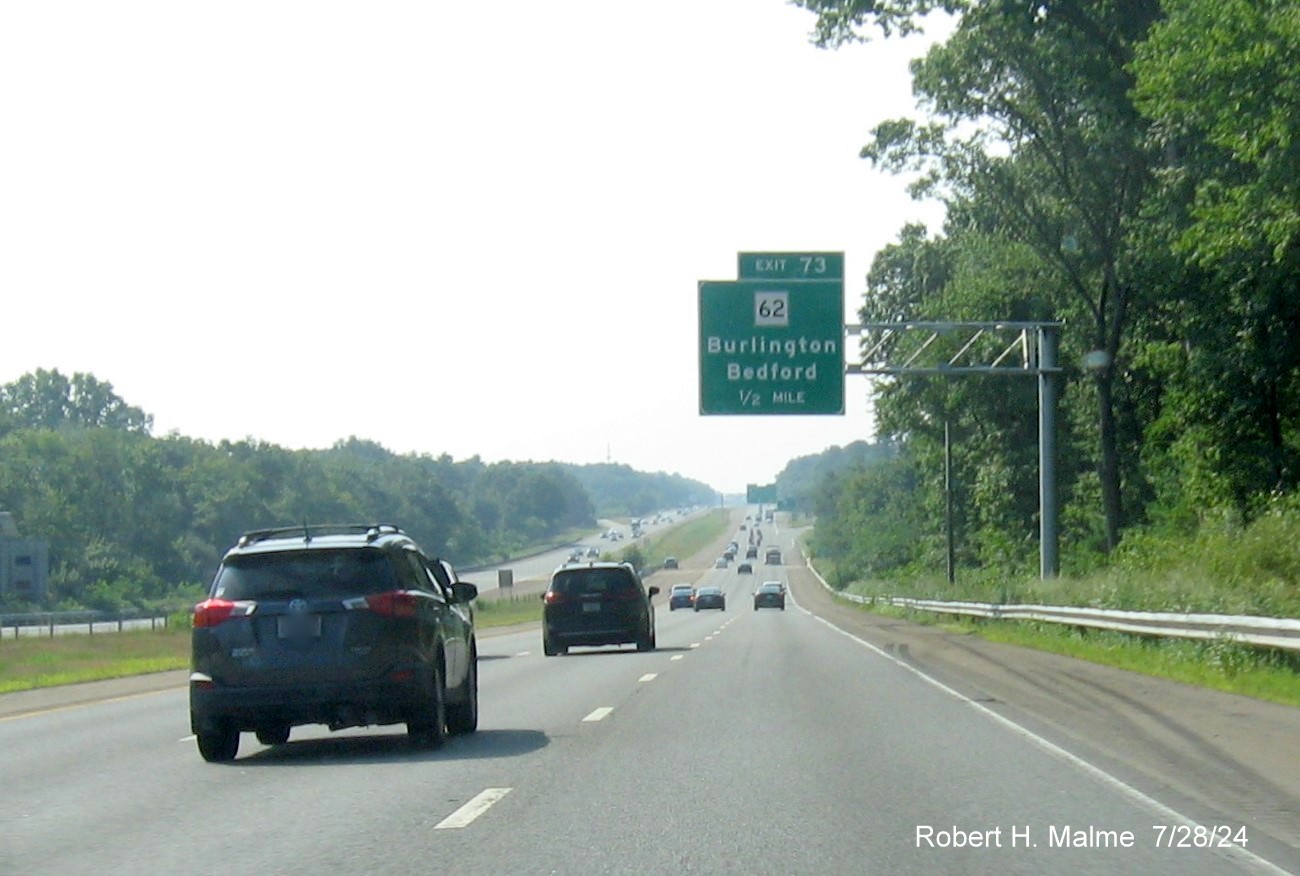 Image of recently placed 1/2 mile advance overhead sign for MA 62 exit on US 3 South in Burlington, July 2024