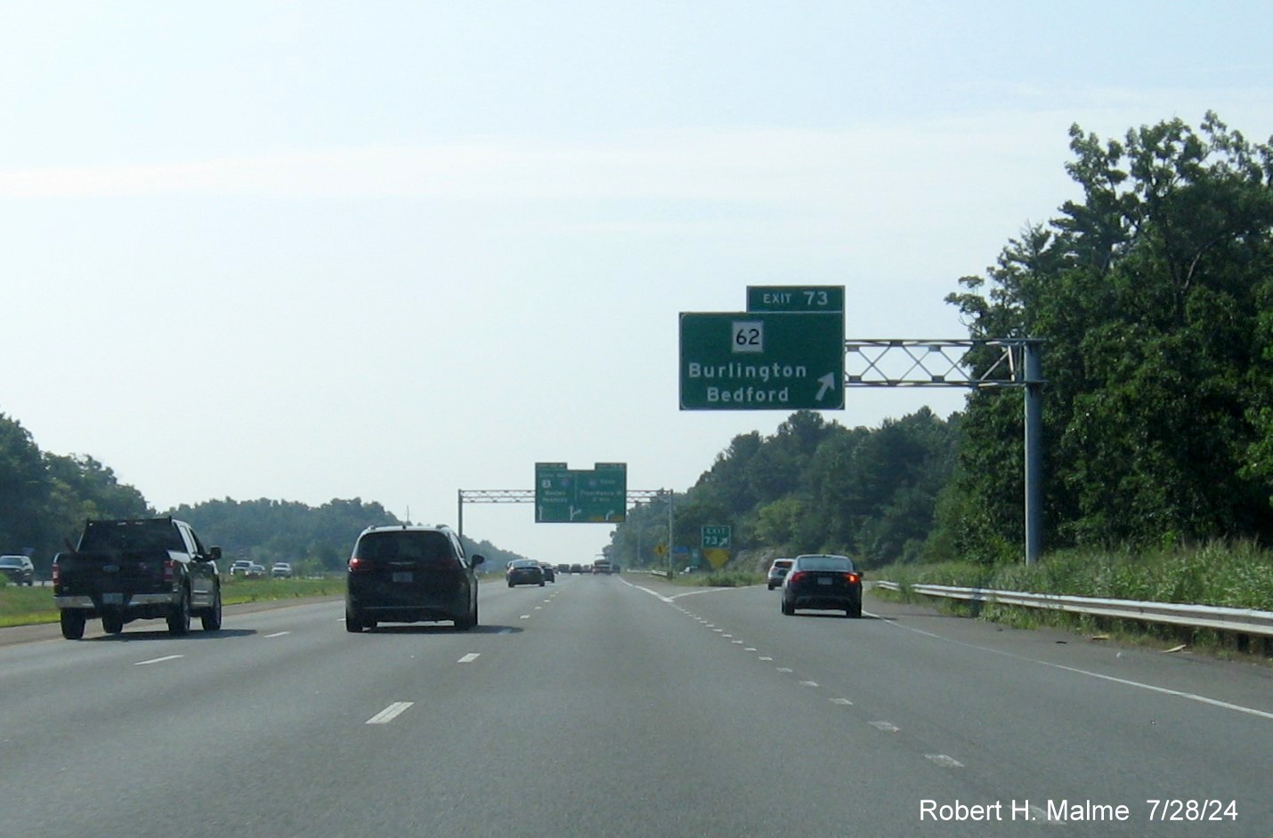 Image of recently placed overhead ramp sign for MA 62 exit on US 3 North in Burlington, July 2024