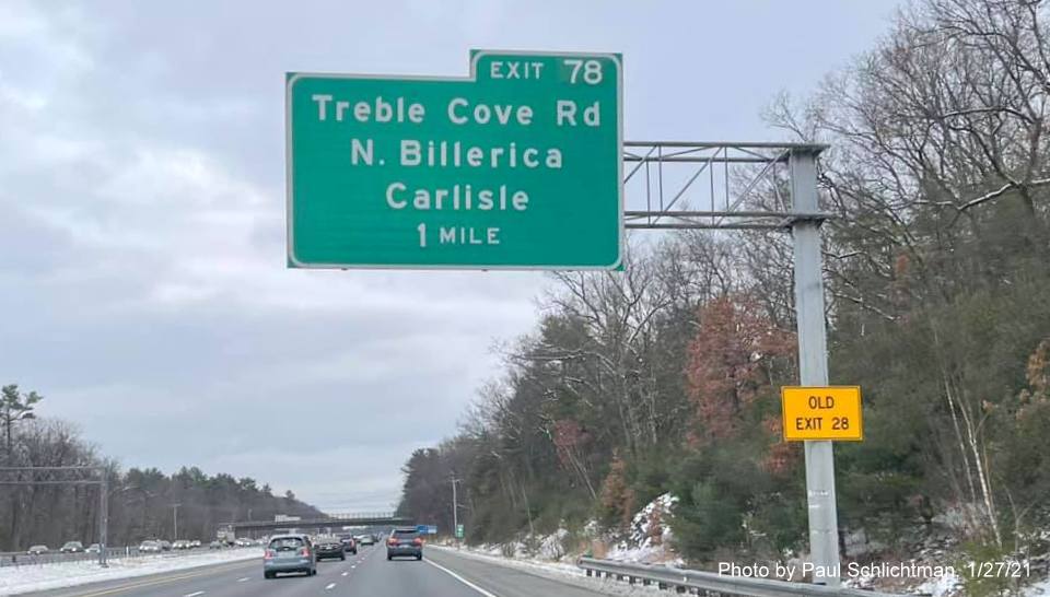 Image of 1-mile advance overhead sign for Treble Cove Road exit with new milepost based exit number and yellow old exit number sign on support post on US 3 South in Billerica, by Paul Schlichtman, January 2021
