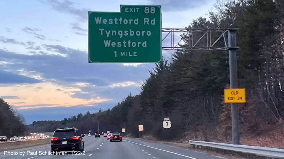 Image of 1-mile advance overhead sign for the Westford Road exit with new milepost based exit number and yellow old exit number sign on support post on US 3 South in Tyngsborough, by Paul Schlichtman, January 2021
