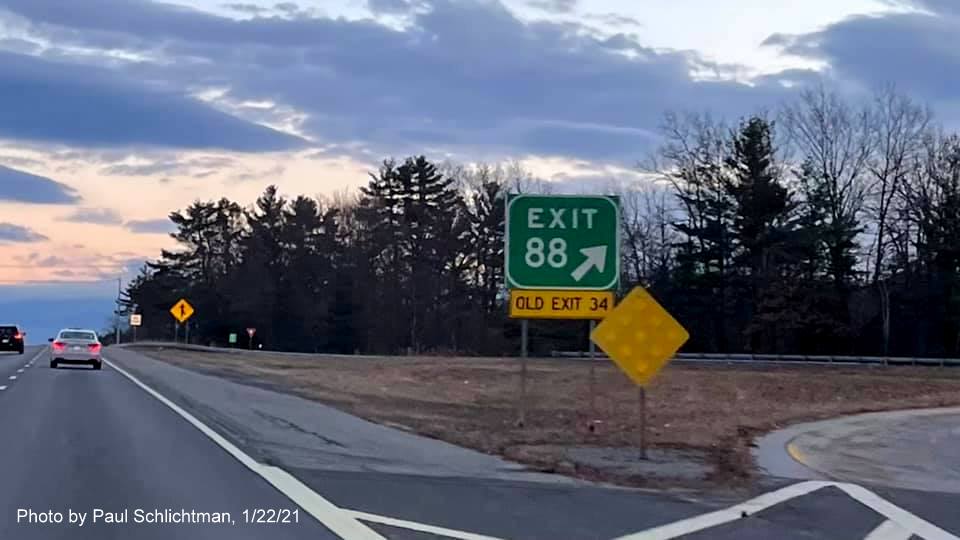 Image of gore sign for the Westford Road exit with new milepost based exit number and yellow old exit number sign below on US 3 South in Tyngsborough, by Paul Schlichtman, January 2021