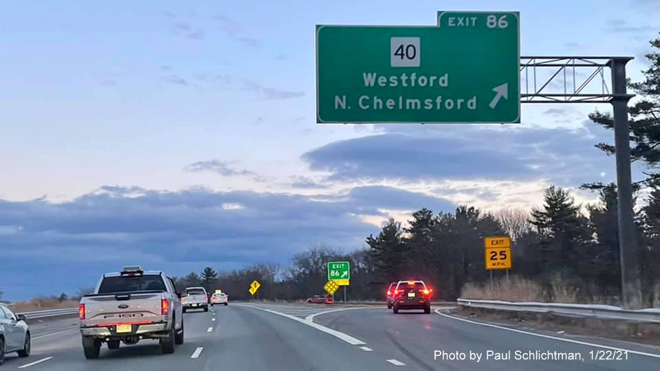 Image of overhead ramp sign for MA 40 exit with new milepost based exit number and gore sign with new number and yellow old exit number sign below on US 3 South in Westford, by Paul Schlichtman, January 2021