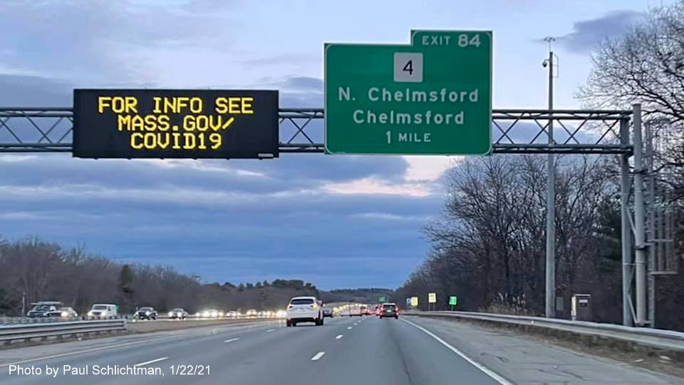 Image of 1-Mile advance overhead sign for MA 4 exit with new milepost based exit number on US 3 South in Chelmsford, by Paul Schlichtman, January 2021