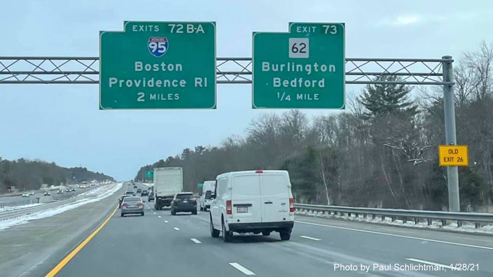 Image of 2 miles advance overhead sign for I-95 exits with new milepost based exit numbers on US 3 South in Bedford, by Paul Schlichtman, January 2021