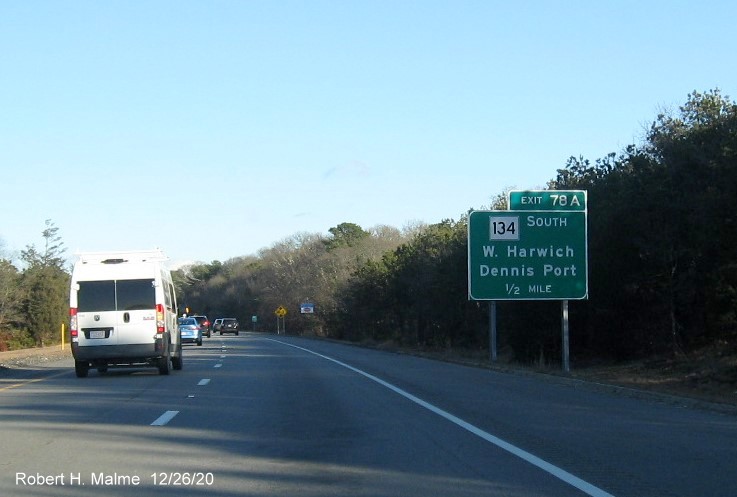 Image of ground mounted 1/2 mile advance sign for MA 134 South exit with new milepost based exit number on US 6 East in Dennis, December 2020
