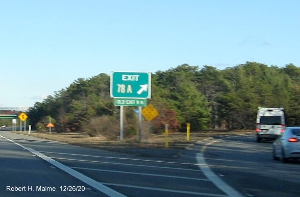 Image of gore ramp sign for MA 134 South exit with new milepost based exit number and green old exit number sign below on US 6 East in Dennis, December 2020