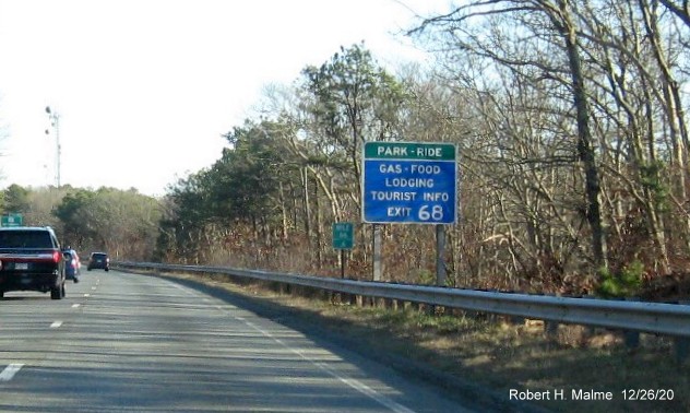 Image of blue services sign for MA 132 exit with new milepost based exit number on US 6 East in Barnstable, December 2020