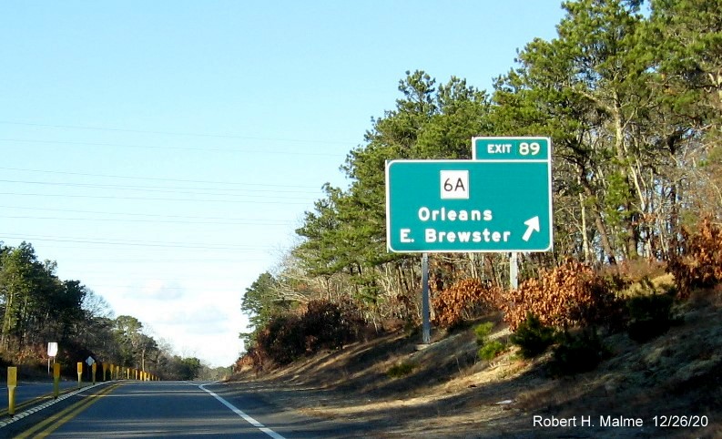 A ground mounted ramp sign for the MA 6A exit with new milepost based exit number on US 6 East in Orleans, December 2020
