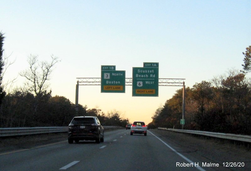 Image of advance overead sign for MA 3 and MA 6A exits with new milepost based exit number for MA 6A on US 6 West in Bourne, December 2020