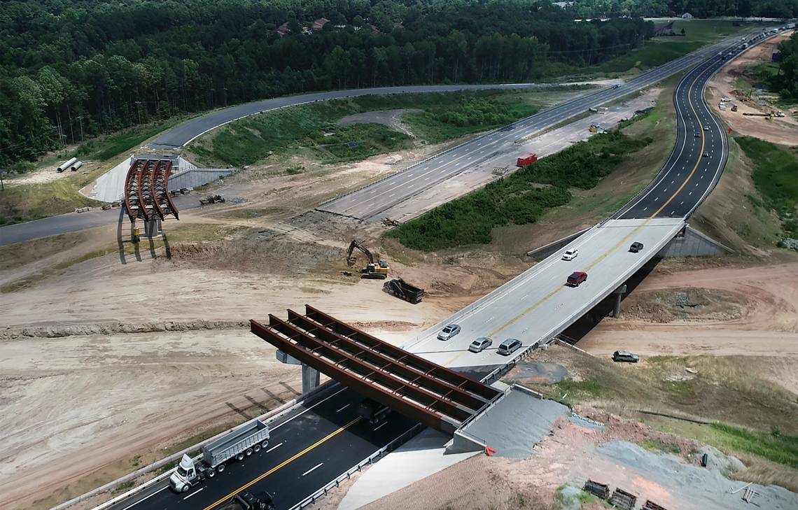 Image of under construction interchange between Future I-885/East End Connector and NC 147/Durham Freeway, by Durham Herald-Sun