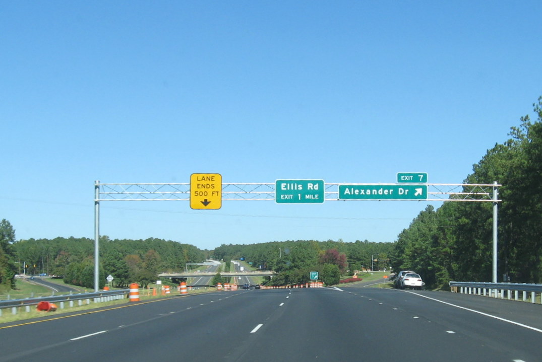 Image of overhead exit signage approaching Alexander
Drive on the Durham Freeway, Oct. 2011