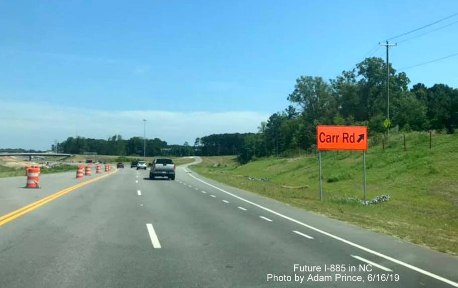 Image of temporary exit ramp sign for new Carr Road exit on US 70 West in Future I-885/East End Connector Project work zone in Durham, by Adam Prince