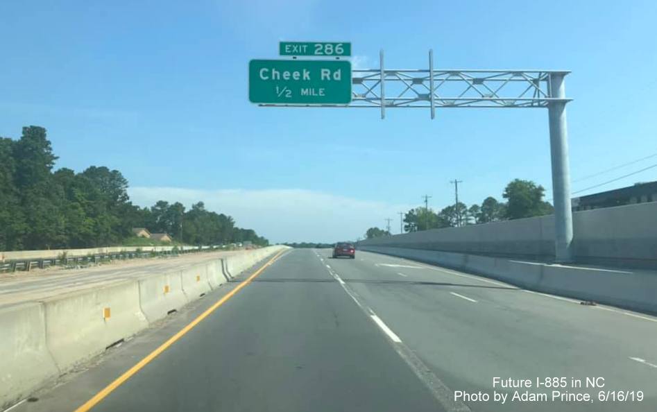Image of new overhead sign for Cheek Road exit on Future I-885 North/US 70 West in East End Connector Project work zone in Durham, by Adam Prince