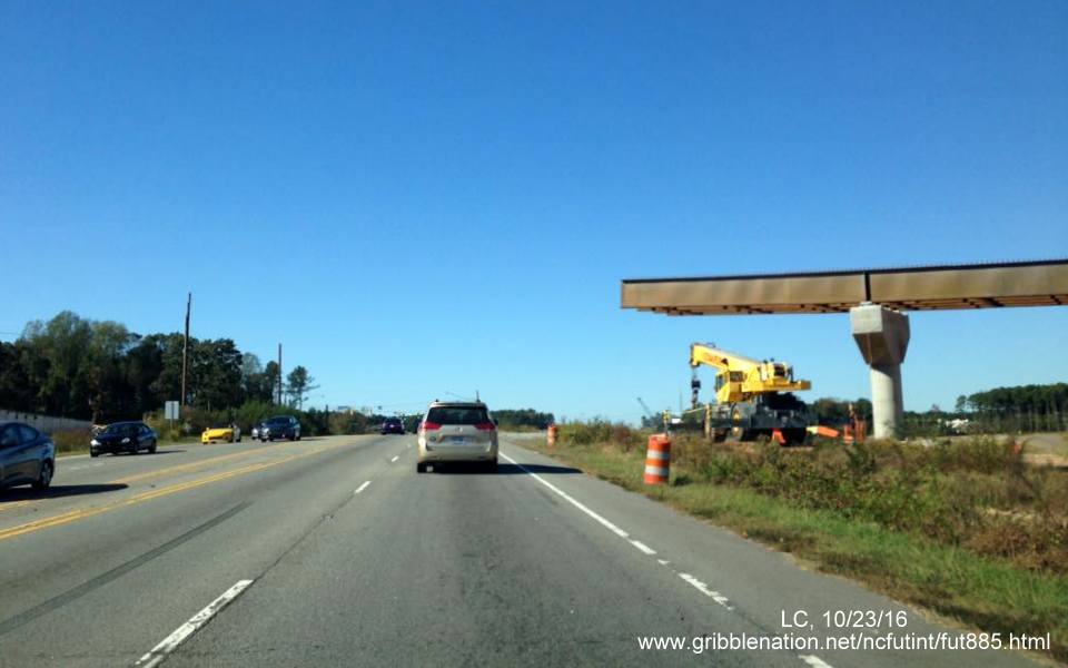Image of new flyover bridge being built over US 70 for East End Connector Project in Durham, by LC