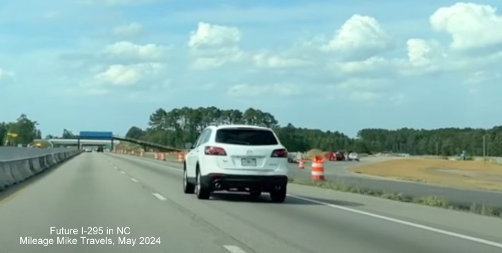 Image of nearly completed ramp from I-95 North to NC 295 (Future I-295) North in St. Pauls, 
       screen grab from Mileage Mike Travels video, May 2024