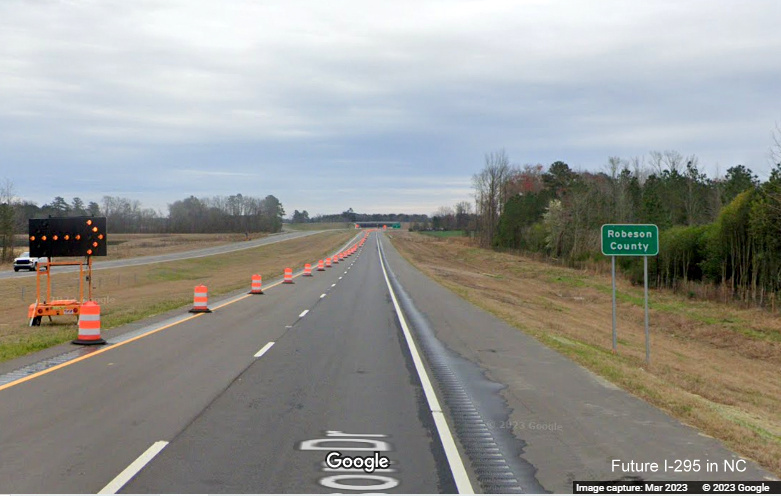 Image of Entering Robeson County guide sign along newly opened section of South 
        NC 295/Fayetteville Outer Loop from Black Bridge Road to Parkton Road, Google Maps Street View, March 2023