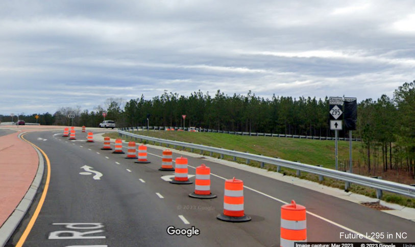 Image of pair of NC 295 trailblazers on Black Bridge Road approaching on-ramp rounabout to newly opened section of NC 295/
        Fayetteville Outer Loop to Parkton Road, Google Maps Street View, March 2023