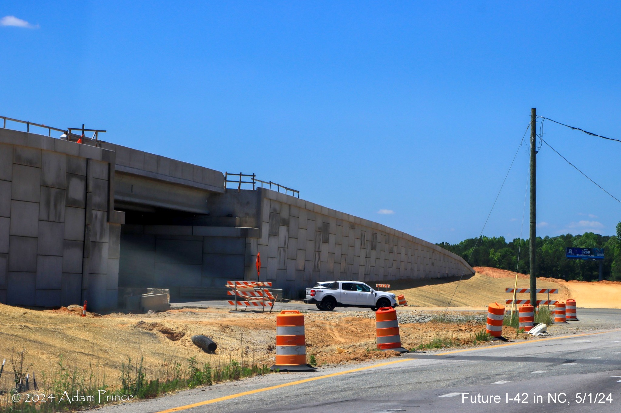 Image of future I-42 bridge from US 70 (Future I-42) West at Wilson's Mills Road 
        intersection, by Adam Prince, May 2024