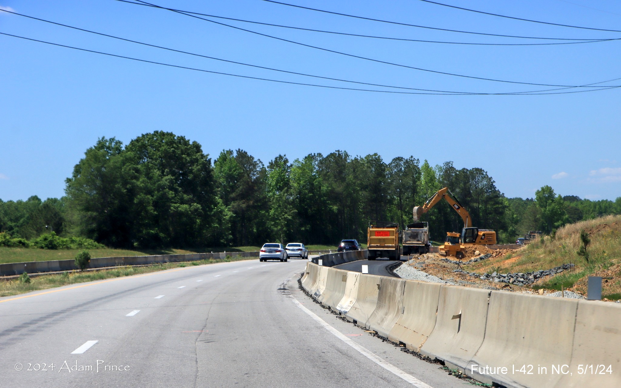 Image of US 70 (Future I-42) West traffic approaching interchange being built at the Swift Creek Road 
        intersection, by Adam Prince, May 2024