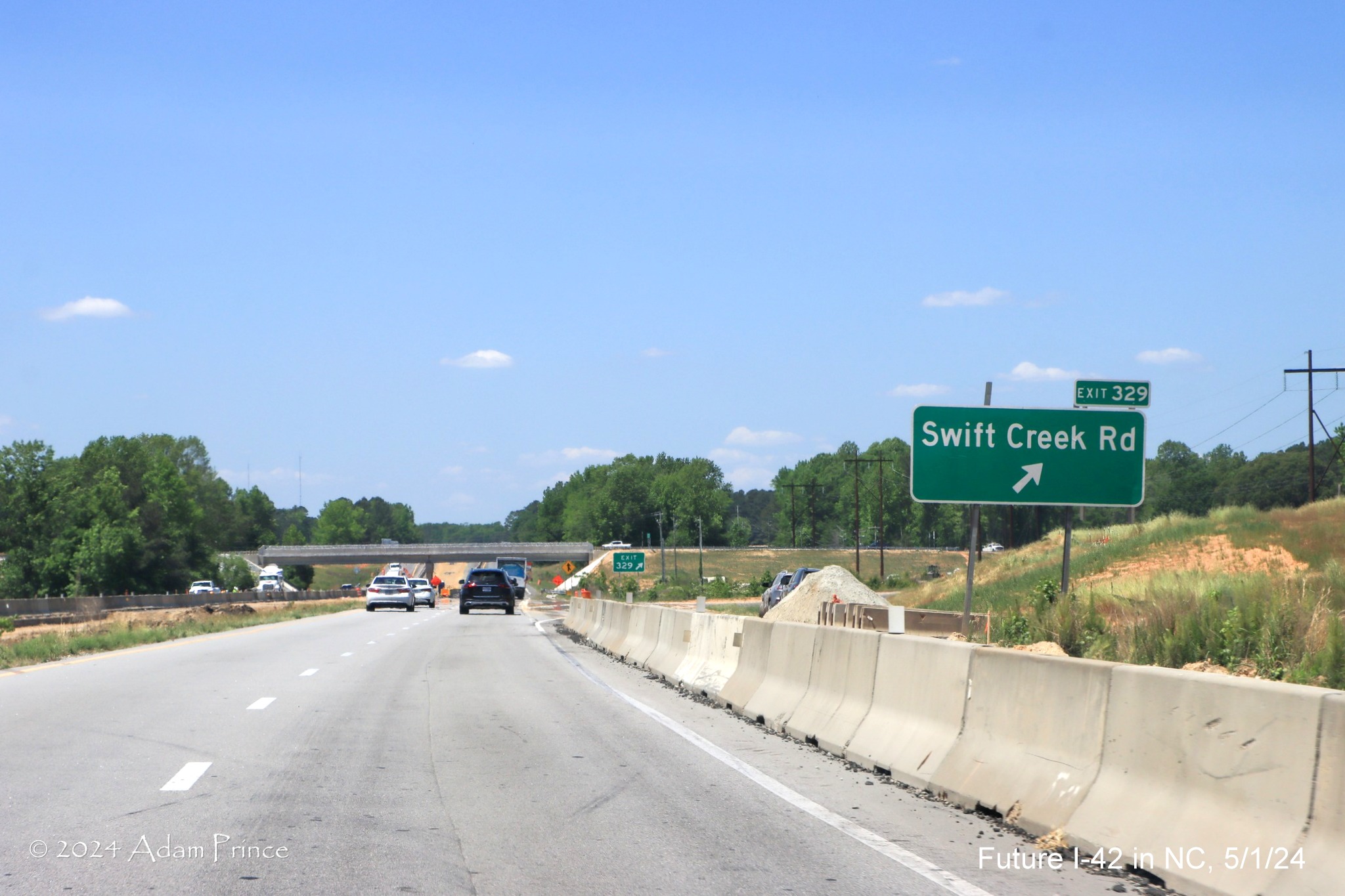 Image of new exit sign for open interchange on US 70 (Future I-42) West at Swift Creek Road in Wilson's 
        Mills, by Adam Prince, May 2024