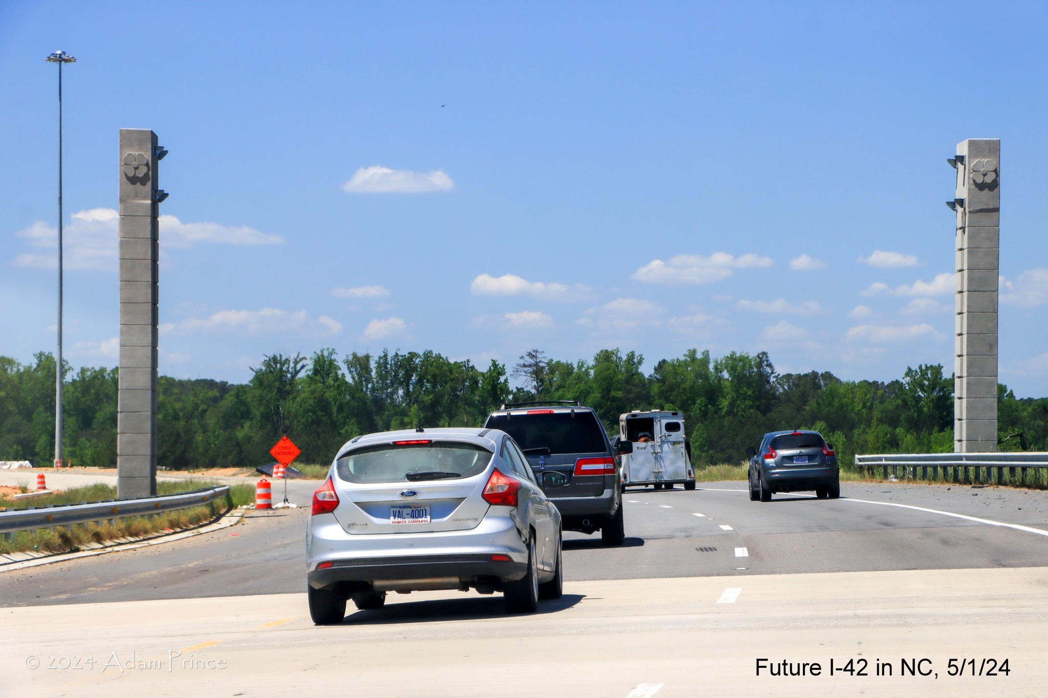 Image of US 70 (Future I-42) West lanes at second sign gantry on the I-40/NC 540 turbine interchange ramps,
        by Adam Prince, May 2024