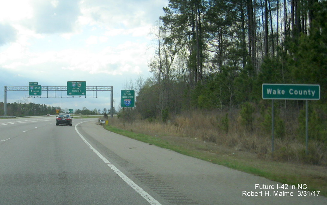 Image of End Future I-42 sign at I-40 exits at end of US 70 West Clayton Bypass in March 2017