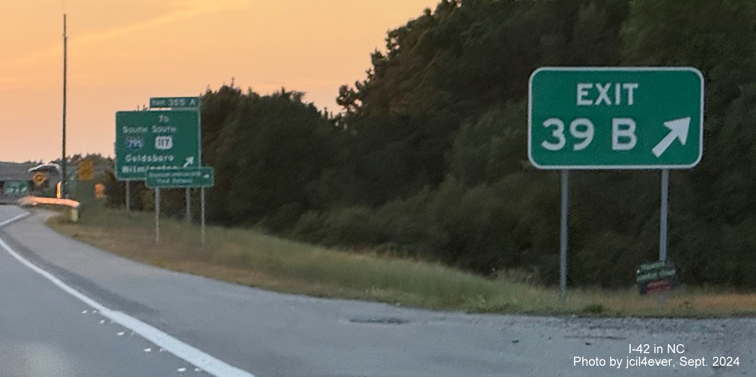 Image of renumbered gore sign with I-42 mileposts for I-795 North exit on Goldsboro Bypass, by jcil4ever, Sept. 2024