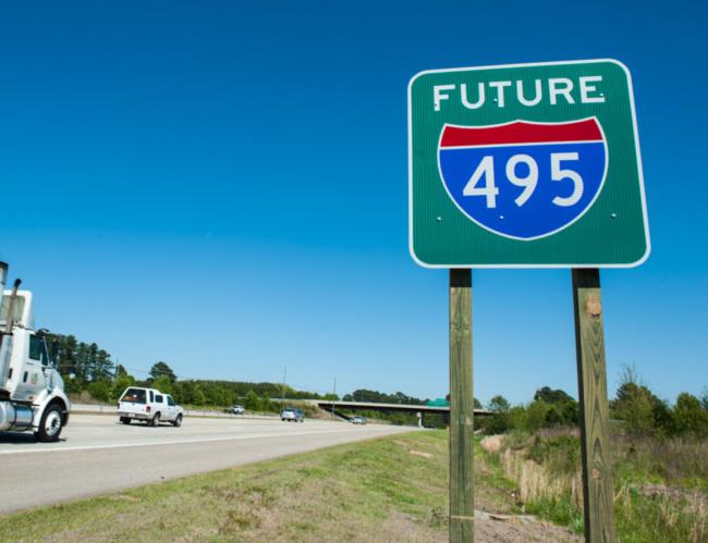 Photo of new Future 495 signs being put up along US 64 in 
NC. From NCDOT