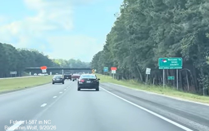 NCDOT traffic camera image of work underway on pavement rehabilitation project east of
	the US 264 Alt exit on US 264 East, September 2026
