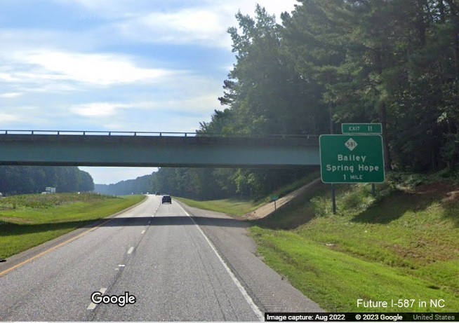 Image of 1 mile advance sign for NC 581 exit with new I-587 milepost exit number on US 264 East in Spring Hope, Google Street View image, August 2022