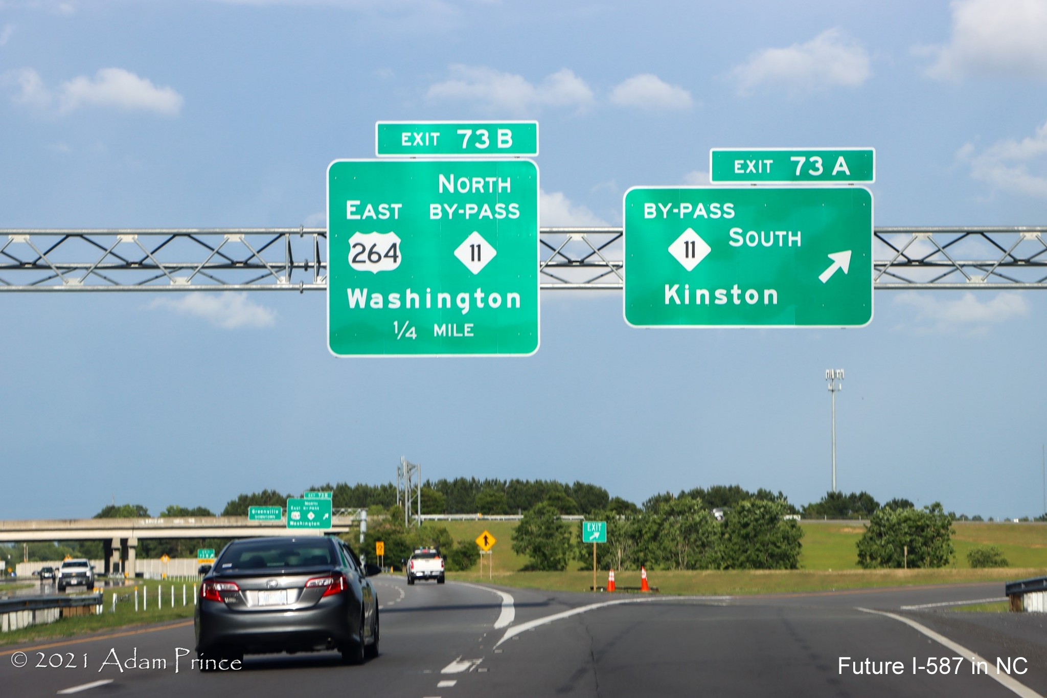 Image of overhead ramp sign for US 264 East/NC 11 Greenville Bypass exit on US 264 East (Future I-587 South) in Greenville, photo by Adam Prince, June 2021