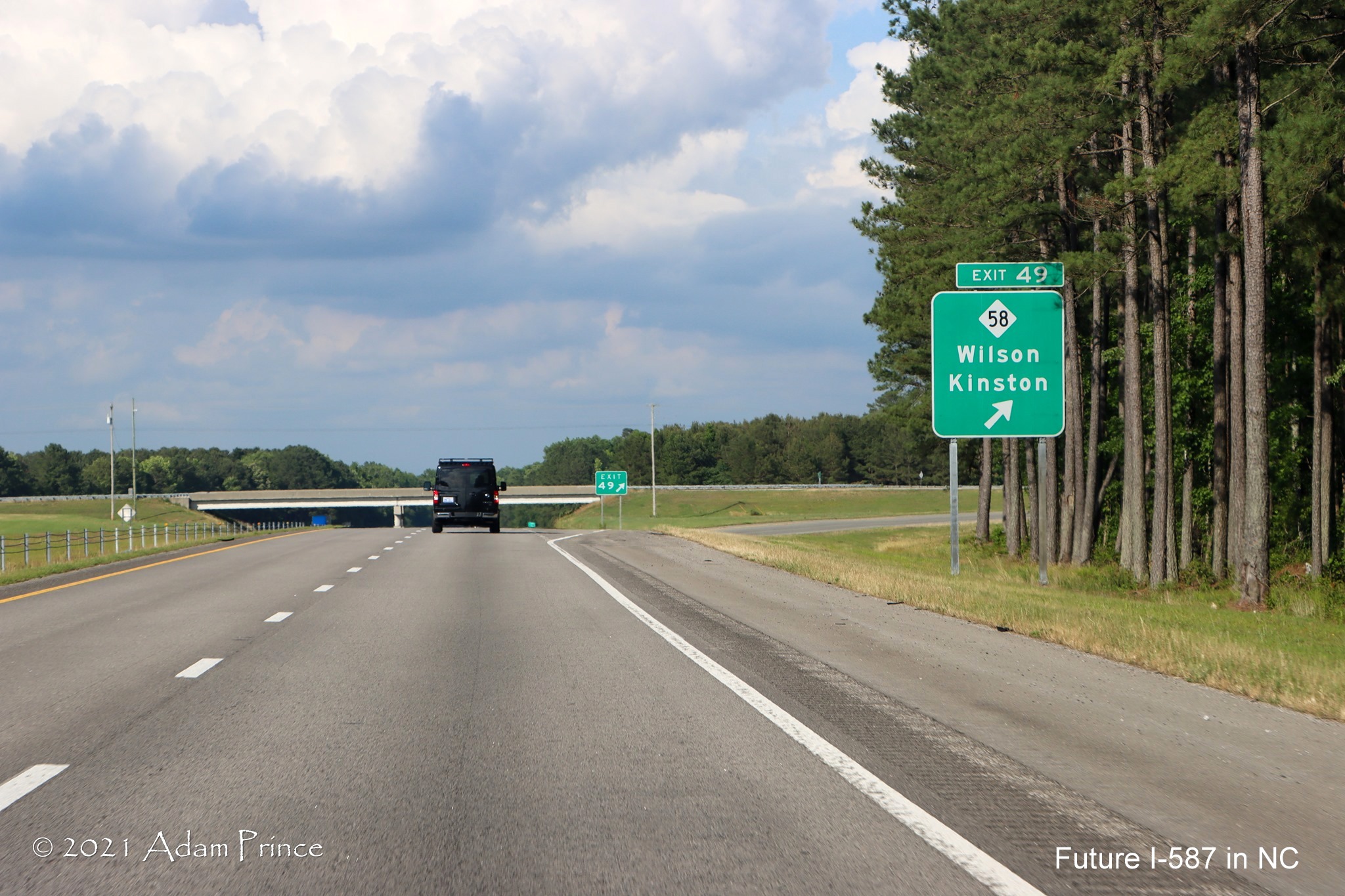 Ground mounted ramp sign for NC 58 exit on US 264 East (Future I-587 South) in Wilson, photo by Adam Prince, June 2021