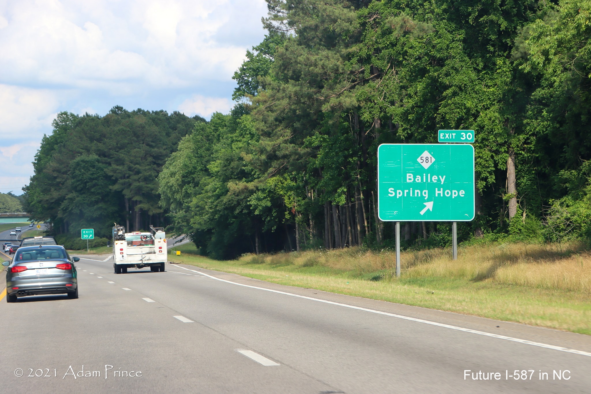 Ground mounted ramp sign for NC 58 exit on US 264 West (Future I-587 North) in Bailey, photo by Adam Prince, June 2021