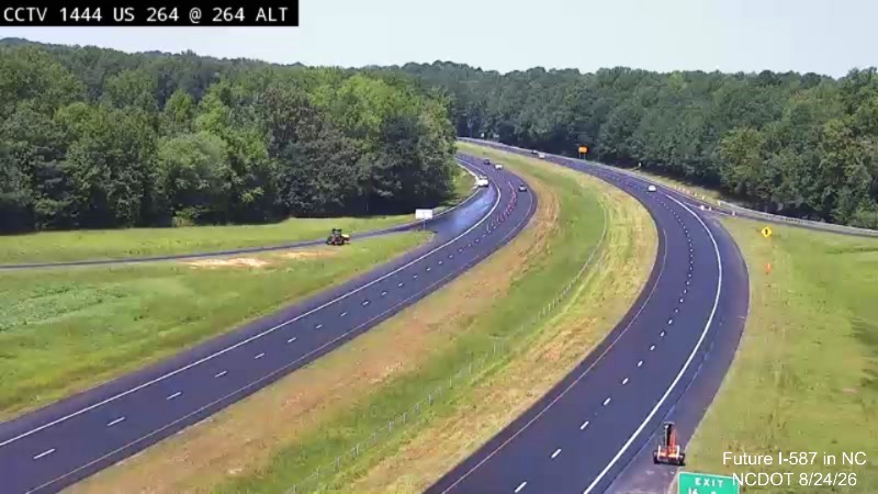 NCDOT traffic camera image of work underway on pavement rehabilitation project east of
	the US 264 Alt exit on US 264 East, June 2026