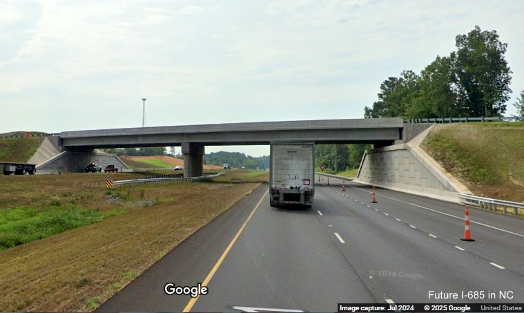 Image of newly opened bridge for Julian Airport Road exit on US 421 (Future I-685) South, Google Maps Street View, July 2024