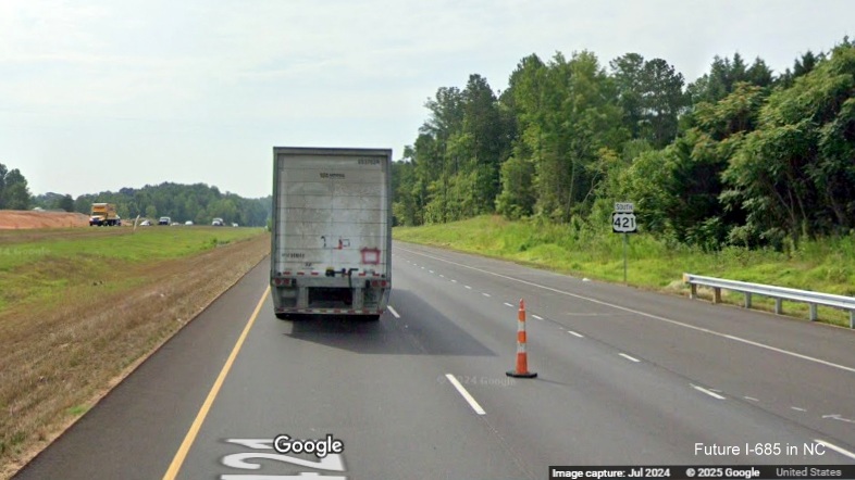 Image of new US 421 South reassurance marker after ramp for Julian Airport Road on US 421 (Future 
        I-685) South, Google Maps Street View, July 2024