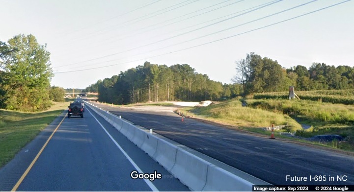 Image of new off-ramp being built for new exit to serve Toyota plant from US 421 South in Julien, 
          Google Maps Street View, September 2023