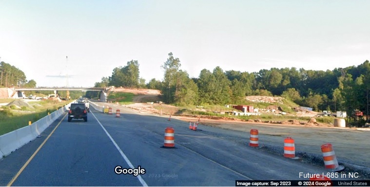 Image of new bridge being built for new exit to serve Toyota plant from US 421 South in Julien, 
          Google Maps Street View, September 2023