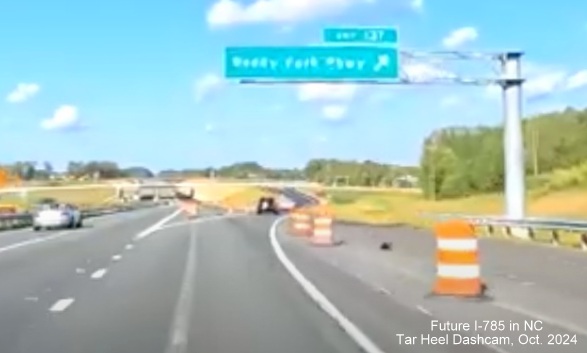 Image of new exit sign for Reedy Creek Parkway on US 29 (Future I-785) North in Greensboro, screen
                                             grab from Tar Heel Dashcam video, October 2024