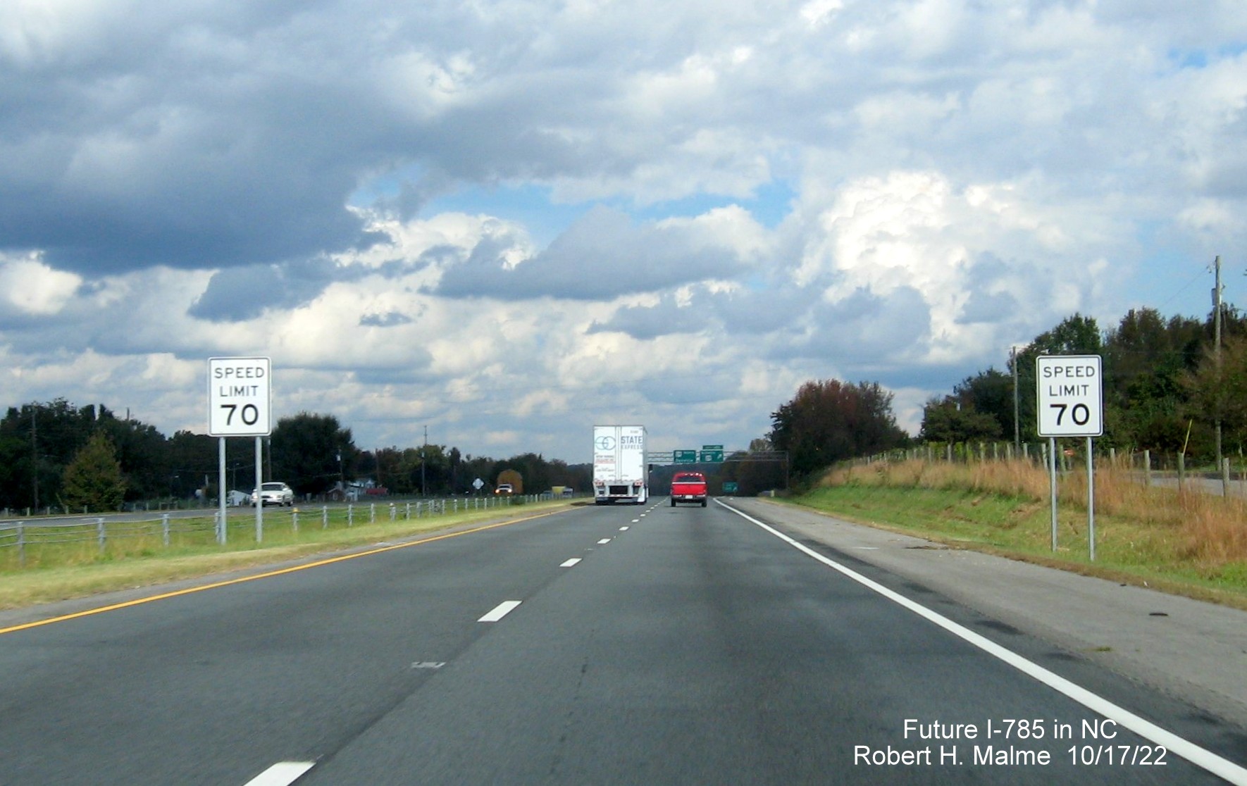 Image of dual Speed Limit 70 signs marking the start of interstate standard freeway on US 29 
       (Future I-785) North in Reidsville, October 2022