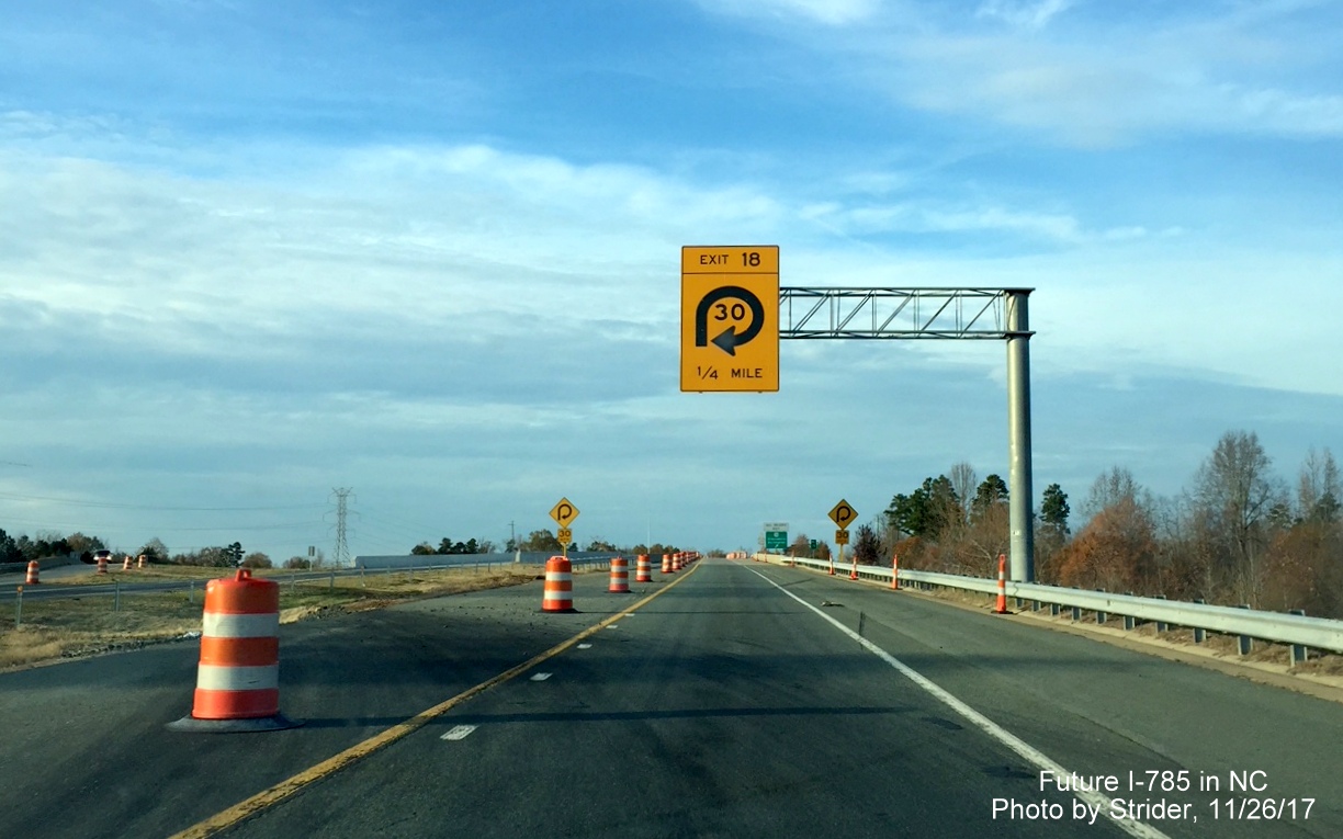 Image of overhead speed advisory sign on ramp from I-785 North to US 70 in Greensboro, by Strider