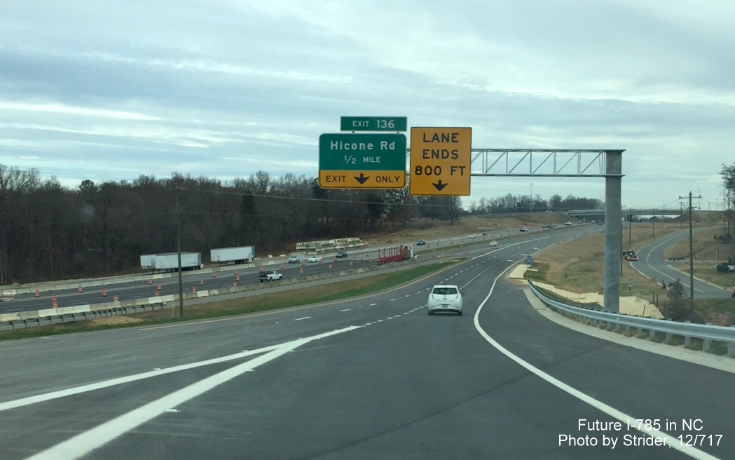 Image of new overhead exit and advisory signs on US 29 North at merge with ramp from I-785/Greensboro Loop North, by Strider