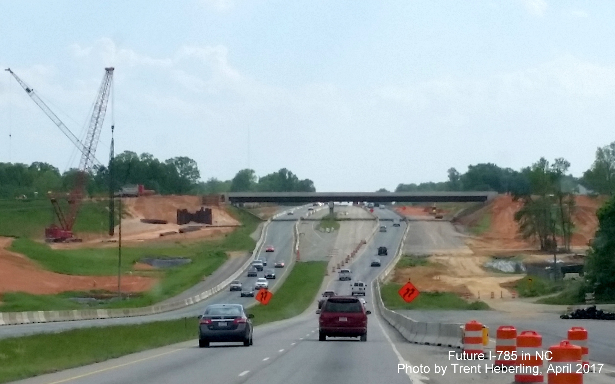 Image looking south on US 29 from Hicone Rd showing I-785/Loop interchange under construction, by Trent Heberling