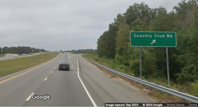 Image of Country Club Road ground mounted ramp sign on US 117 (Future I-795) South in Goldsboro, Google Maps Street View, September 2023